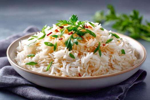 steamed-basmati-rice-seasoned-with-spring-onion-and-parsley-resting-in-a-bowl-photo